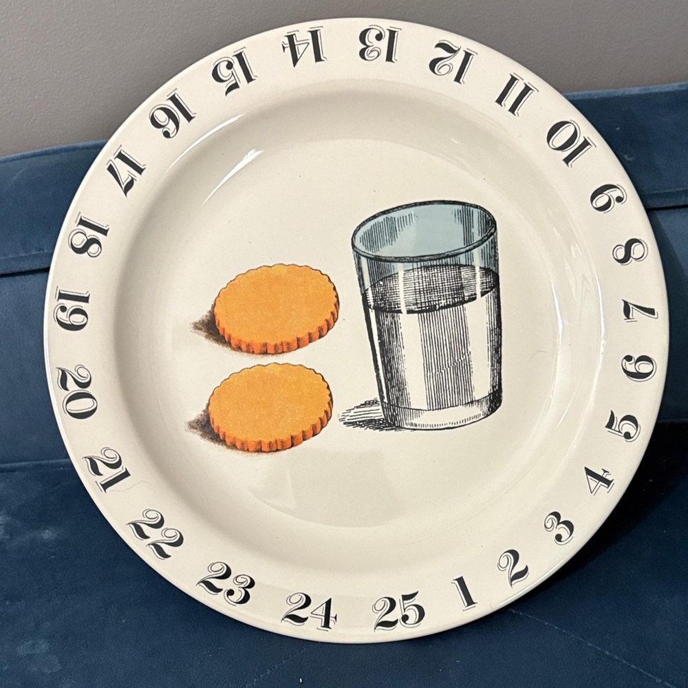 Cream Holiday Plate with Orange Cookie and Blue Glass Illustration